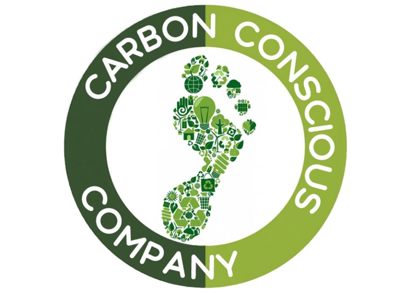 Carbon Conscious Company - A two tone green circle with white text saying a Carbon Conscious Company. In the centre is a green footprint made of small symbols.