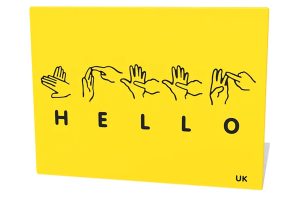 The Hello Sign Language Play Panel is a yellow panel engraved to black with the image and text for how to say hello in sign language.